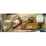 a set of brass postage scales + weights; an angle poise magnifier.