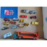 A selection of 1950's/60's Lesney and other diecast vehicles with a car transporter
