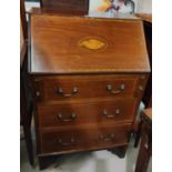 A mahogany Sheraton style bureau with fall front, three drawers below and fitted interior, shell