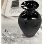 A clear glass lobed dish by DAUM with etched signature, max width 10.5cm; a black glass baluster