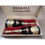 A wooden presentation case with 2 bottles of HENKELL Trocken Special Reserve sparkling wine