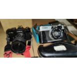 Two vintage SLR cameras