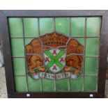 An oak framed stained leaded glass crest of Plymouth 50 x 57cm