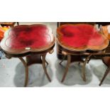 A Continental pair of period style occasional tables, clover leaf shaped with inset red leather tops