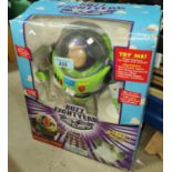 A Buzz Lightyear figure in original box (box a.f.)