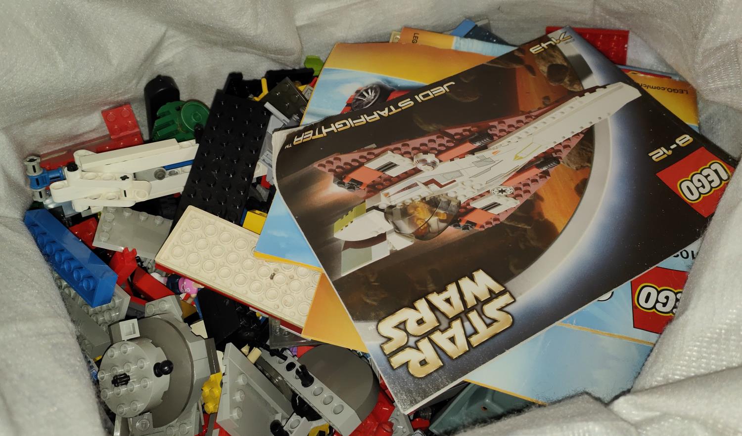 A very large selection of Lego pieces including Lego Star Wars AT-AT and X-Wing instructions and - Image 2 of 2