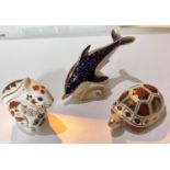 Three Royal Crown Derby animals:  dolphin, tortoise and squirrel