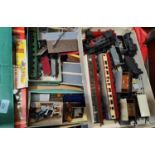 A large collection of 00 gauge railway accessories including track buildings locomotives,