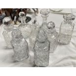 Eight various cut crystal decanters