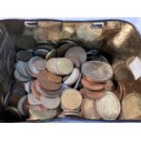 A tin of coins and tokens, over 2kg