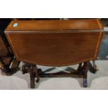 An Edwardian mahogany Sutherland table with satinwood banded decoration