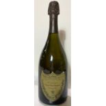 S bottle of Moet & Chandon Champagne Cuvee DOM PERIGNAN vintage 1995 (very slight tear to lower edge