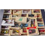 An early boxed W. Britains R.A No 1201 Royal Artillery Gun and a selection of Lledo cars and