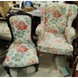 An Early 20th century armchair upholstered in floral material and another spoon back chair similar