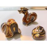 Three Royal Crown Derby animals:  dragon, swan and mouse