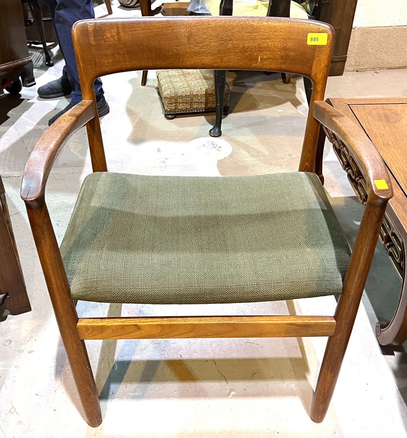 A 1970's era teak carver dining chair