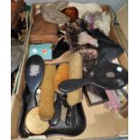 An ebony dressing table set with silver mounts; an evening bag; gloves; bric-a-brac