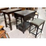 An oak trestle occasional table, a book rack and a stool: an oak drop leaf occasional table