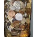 A tin of coins and tokens, over 2kg