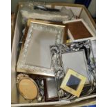 A selection of photos and miniature frames