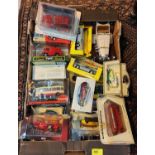 A selection of some loose some boxed diecast vehicles, various makers