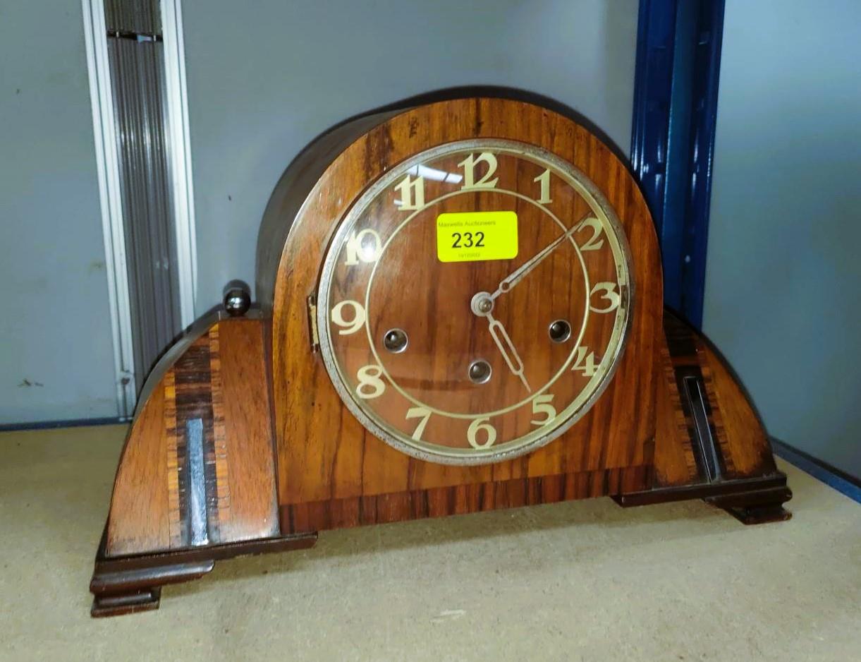 An Art Deco mantel clock in inlaid walnut case with chrome mounts