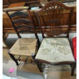 A country made ladder back rush seat chair and two mahogany Chippendale style dining chairs with