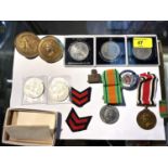 A selection of medals awarded to:  George Mackenzie, Special Constable; and a badge; Defence