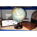 A mid 20th century world globe; a modern barometer; etc.