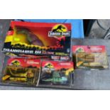 A large Jurassic Park boxed, Tyrannosaurus Rex, other dinosaurs, boxes a.f