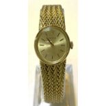 A ladies Rolex wristwatch 14 carat gold stamped 585 on integral woven bracelet, baton markers in