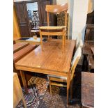 A 1970's teak dining table with rectangular top