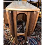 A teak mid century oval drop leaf dining table 167cm