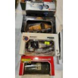 Three boxed Burago diecast vehicles and another Bburago Diamonds 300L