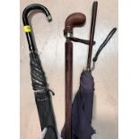 Three vintage parasol / umbrellas, 1 with leather handle