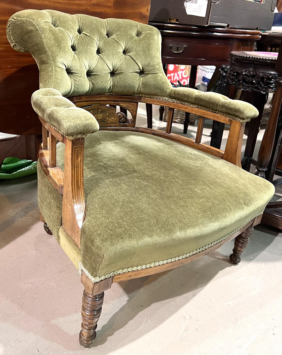 Edwardian Sheraton style inlaid mahogany tub shaped armchair with deep buttoned green Dralon on