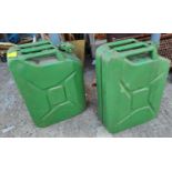 Two green painted 1950's military petrol cans