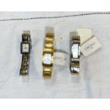 Three ladies DKNY fashion wristwatches, two stainless steel, one gilt cased