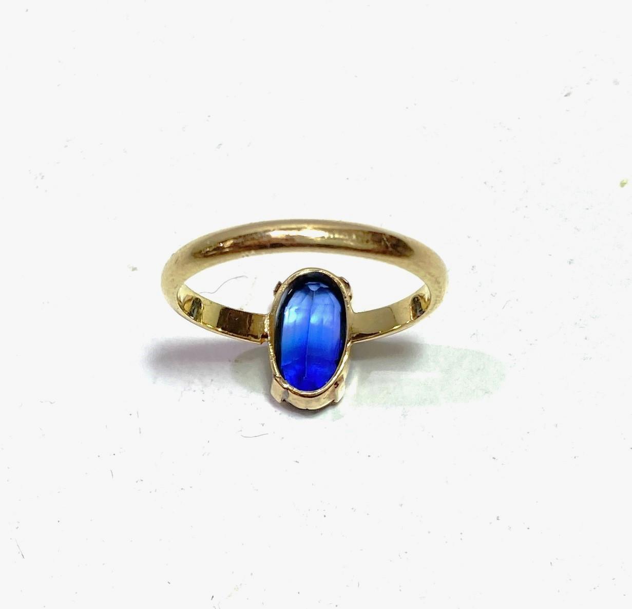 A lady's dress ring with elongated oval sapphire (11 x 6mm approx), in simple 4 claw setting, the - Image 3 of 3