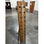 A designer mango wood wine rack by Bluebone designs. 59½' high
