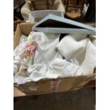 A box of table linen and other textiles