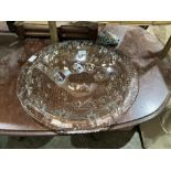 A studio glass bowl with fish moulded decoration. 19½' diam.