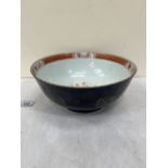 A Chinese blue glazed bowl. 10¼' diam.