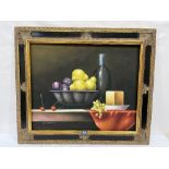 W. HUDSON. 20TH CENTURY Still life of fruit with wine bottle. Signed. Oil on canvas 20' x 24' (Frame