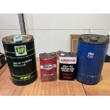 Four automotive oil cans