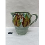 A Clarice Cliff for Newport Pottery Celtic Leaf and Berry pattern jug, shape no 41A. 7½' high