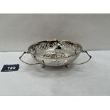 A George V silver pierced three handled bowl. Birmingham 1910. 5' diam. 3ozs 8dwts