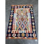 A Choli Kilim rug. 1.50m x 1.00m