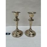 A pair of Edward VII silver loaded candlesticks. Birmingham 1907. 7' high