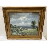 20TH CENTURY SCHOOL. An extensive landscape with hillside village. Indistinctly signed. Oil on